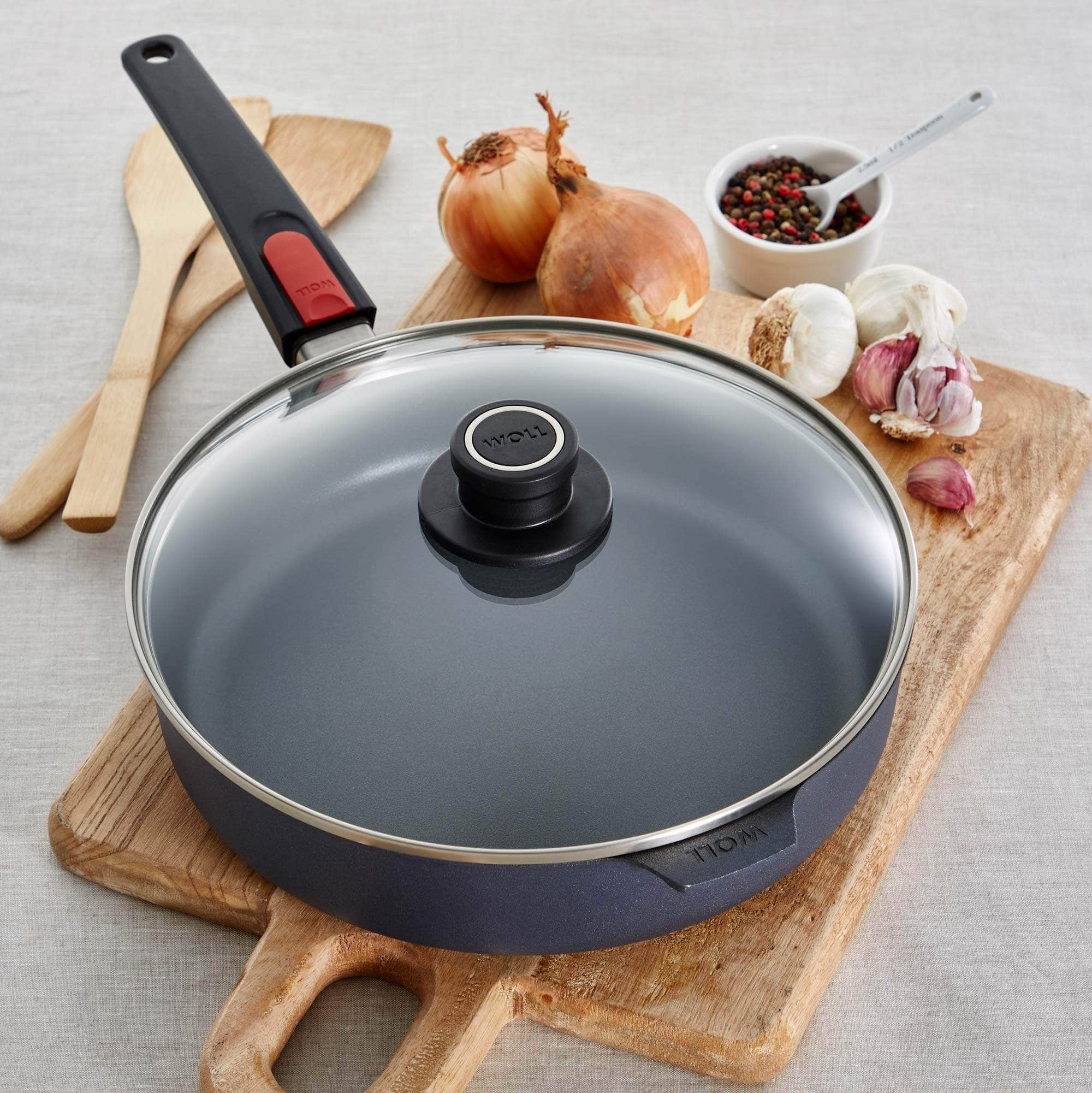 http://blakeandbull-wholesale.co.uk/cdn/shop/products/Non-Stick-Frying-Pan-Lid-On-Woll.jpg?v=1648216284