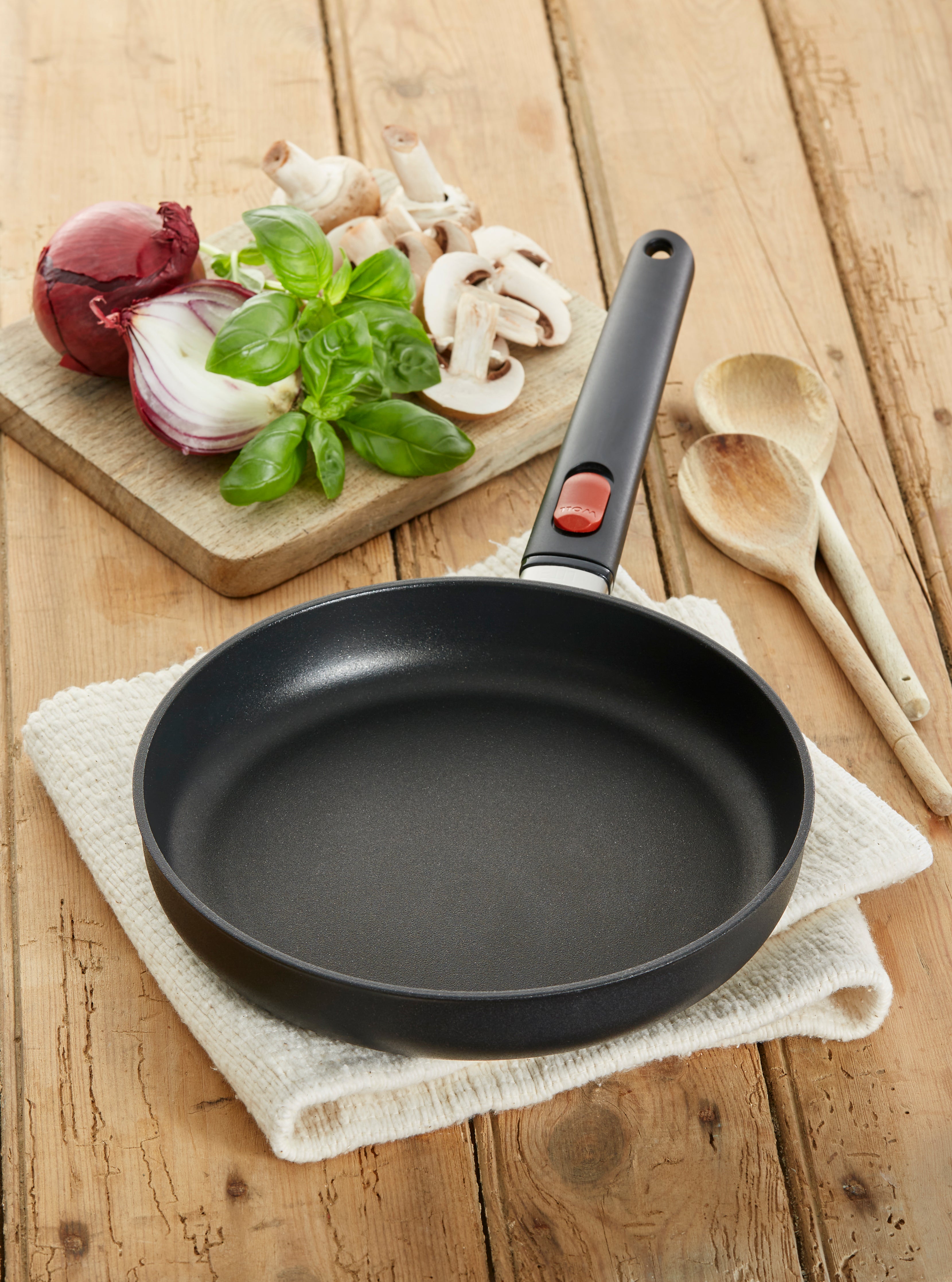 https://blakeandbull-wholesale.co.uk/cdn/shop/products/WollEcoLiteShallowFryingPan24cm_3319x.jpg?v=1681905471